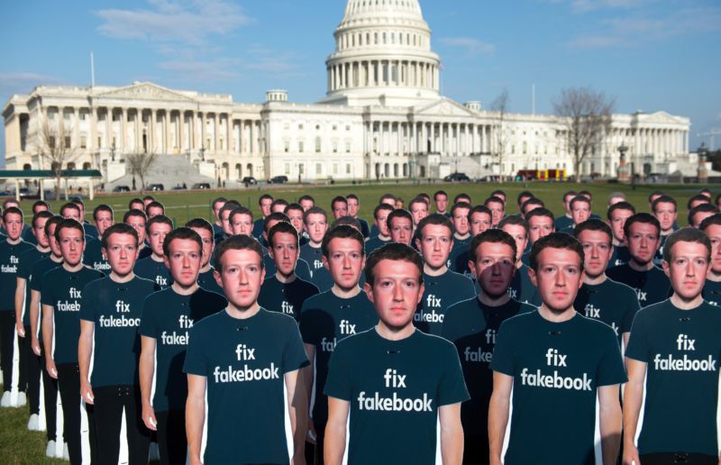 One hundred cardboard cutouts of Facebook founder and CEO Mark Zuckerberg stand outside the US Capitol in Washington, DC, April 10, 2018.