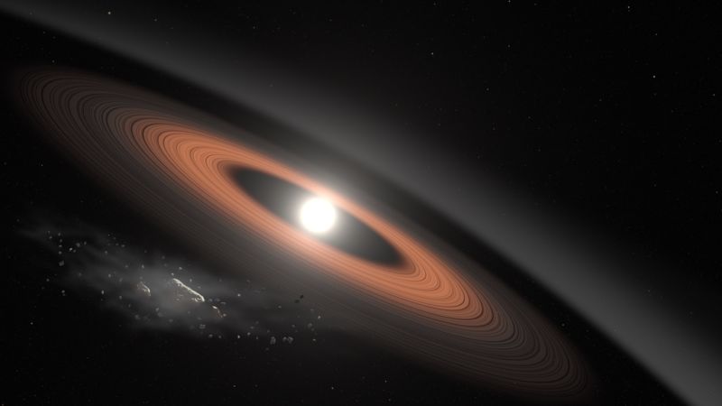 Image of a small star surrounded by a disk of material.