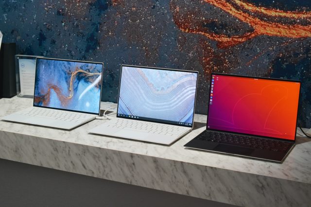 Dell's 2020 CES lineup: two of the new XPS 13 laptops next to the new XPS 13 Developer Edition laptop (in black).