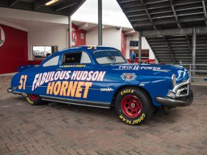 A blue 1950s race car