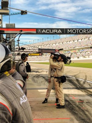NBC's TV crew film in the pit lane at Daytona