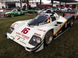 A white Porsche racing car from the 1980s