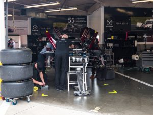 A Mazda racing prototype being worked on in the garage