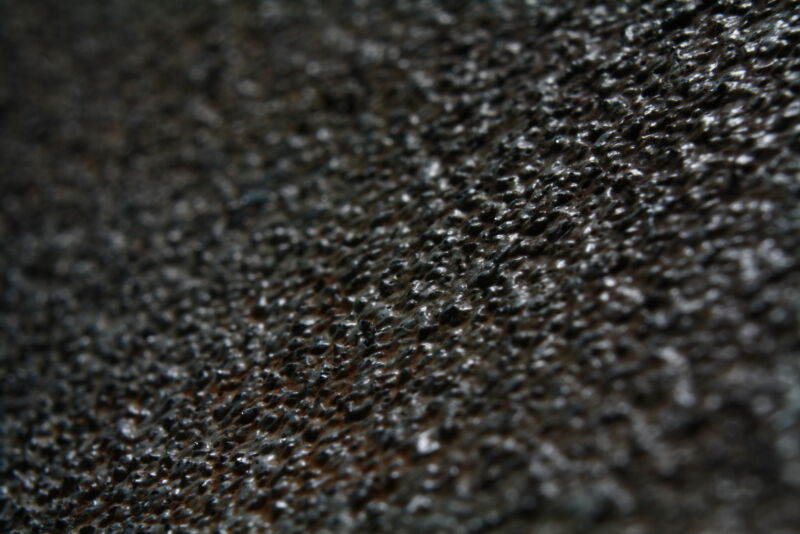 Image of a rough, textured surface.