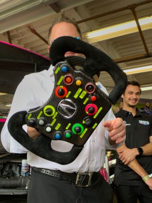 A race car's steering wheel