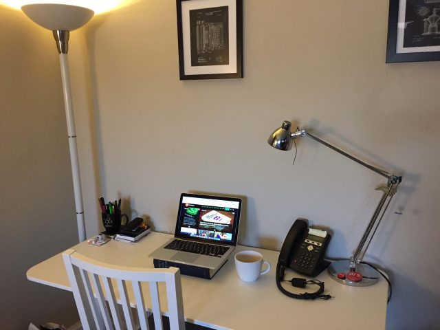 A wider shot of Beth Mole's home office. Beth loves lamp.