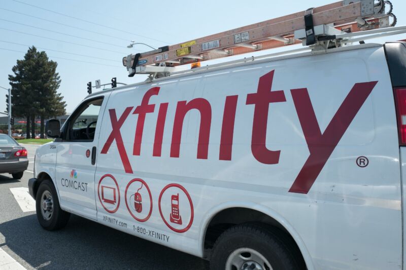 A Comcast service van with the brand name 