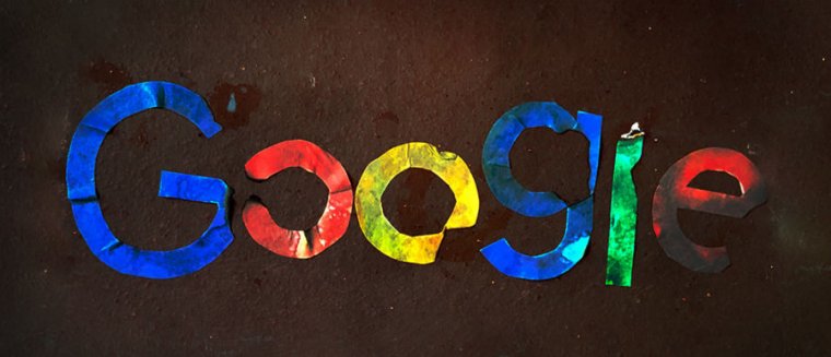 Photo of the Google logo but each letter is burned or damaged