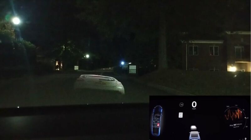This image, taken from the interior of a Tesla Model X, shows a projected image of a car in front of the Model X. The inset in the bottom right, created by Nassi from the Model X's logs, shows the Model X detecting the projection as a real car.