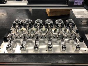 Six pistons and conrods