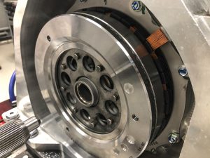 A flywheel and electric motor