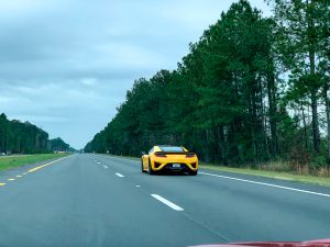 A yellow NSX on the highway