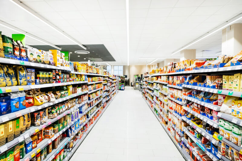 Stock photo of a grocery store aisle.