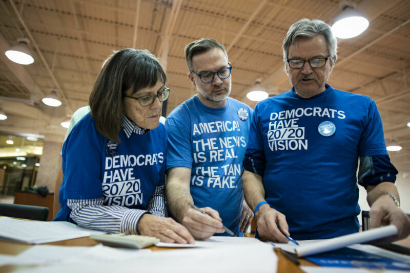 Volunteers tally votes during the first-in-the-nation Iowa caucus at the Southridge Mall in Des Moines, Iowa, US, on Monday, Feb. 3, 2020. The app used to submit the results turned out not to be seamless, scalable or robust.