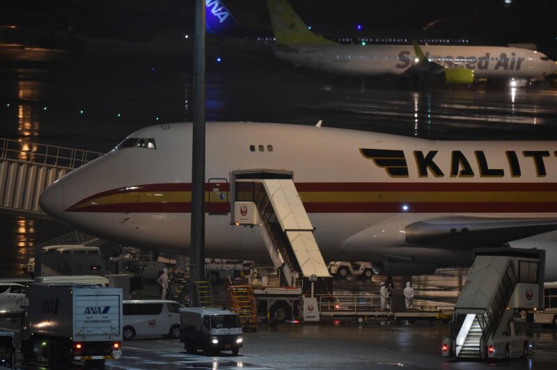 Jumbo jets arrived to evacuate US citizens from the Diamond Princess cruise ship, with people quarantined onboard due to fears of the new COVID-19 coronavirus, at the Haneda airport in Tokyo on February 16, 2020. - The number of people who have tested positive for the new coronavirus on a quarantined ship off Japan's coast has risen to 355, the country's health minister said. (Photo by Kazuhiro NOGI / AFP) (Photo by KAZUHIRO NOGI/AFP via Getty Images)