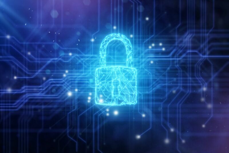 Illustration of a padlock over a computer-chip circuit board.