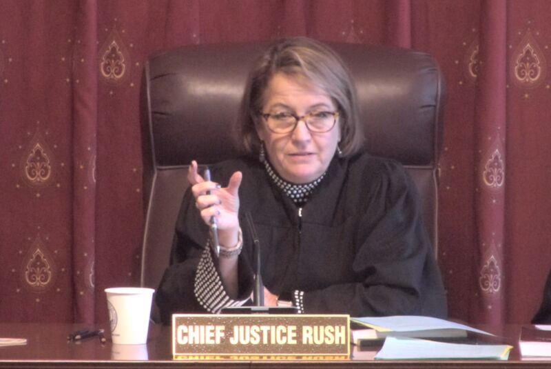 A woman in judicial robes pontificates.