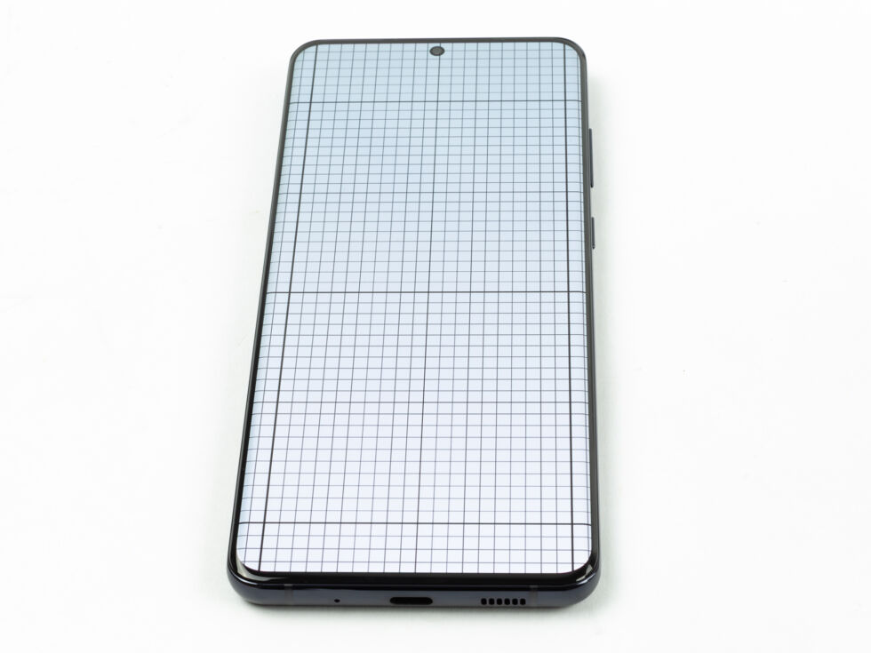 This is meant to show how the screen curves. You'll only see the grid distort very close to the sides.