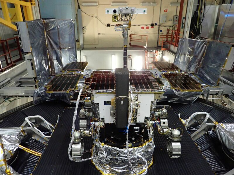 Image of a rover's camera mast and solar panels.