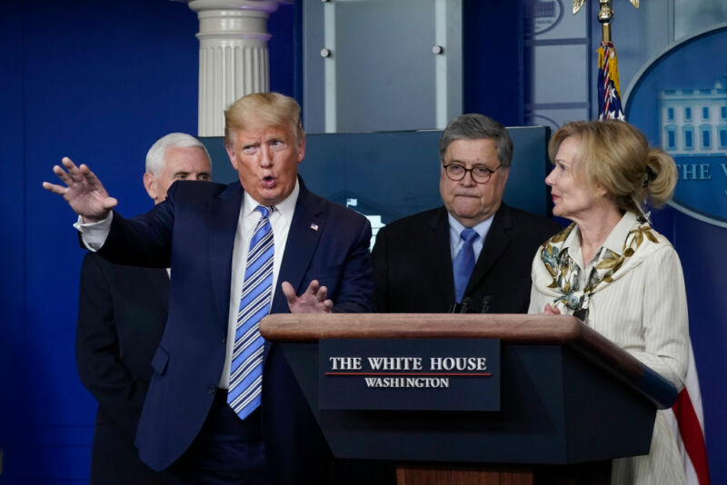 Image of President Trump gesturing during a press conference.