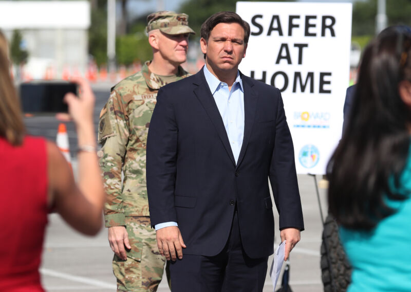 MIAMI GARDENS, FLORIDA - MARCH 30:  Florida Gov. Ron DeSantis attends a news conference in the Hard Rock Stadium parking lot on March 30, 2020 in Miami Gardens, Florida. 