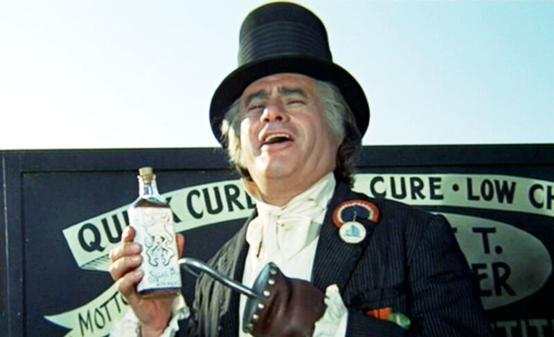 CALGARY - DECEMBER 23: LITTLE BIG MAN, theatrical movie originally released December 23, 1970.  The film was directed by Arthur Penn. Pictured, Martin Balsam (as Mr. Allardyce T. Meriweather), a traveling swindler and snake oil salesman. 