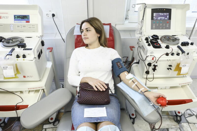 Image of a woman donating blood.
