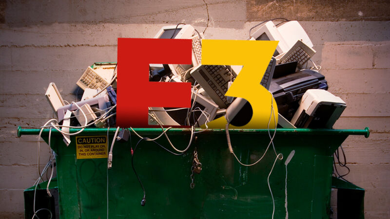 The logo for E3 has been photoshopped into a crowded dumpter.