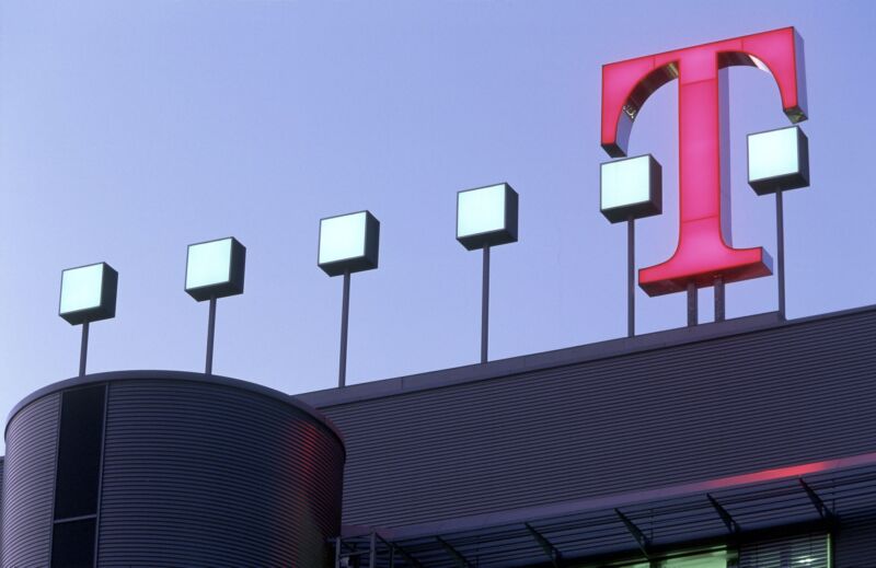 A T-Mobile sign seen on the outside of the Deutsche Telekom headquarters in Bonn, Germany.