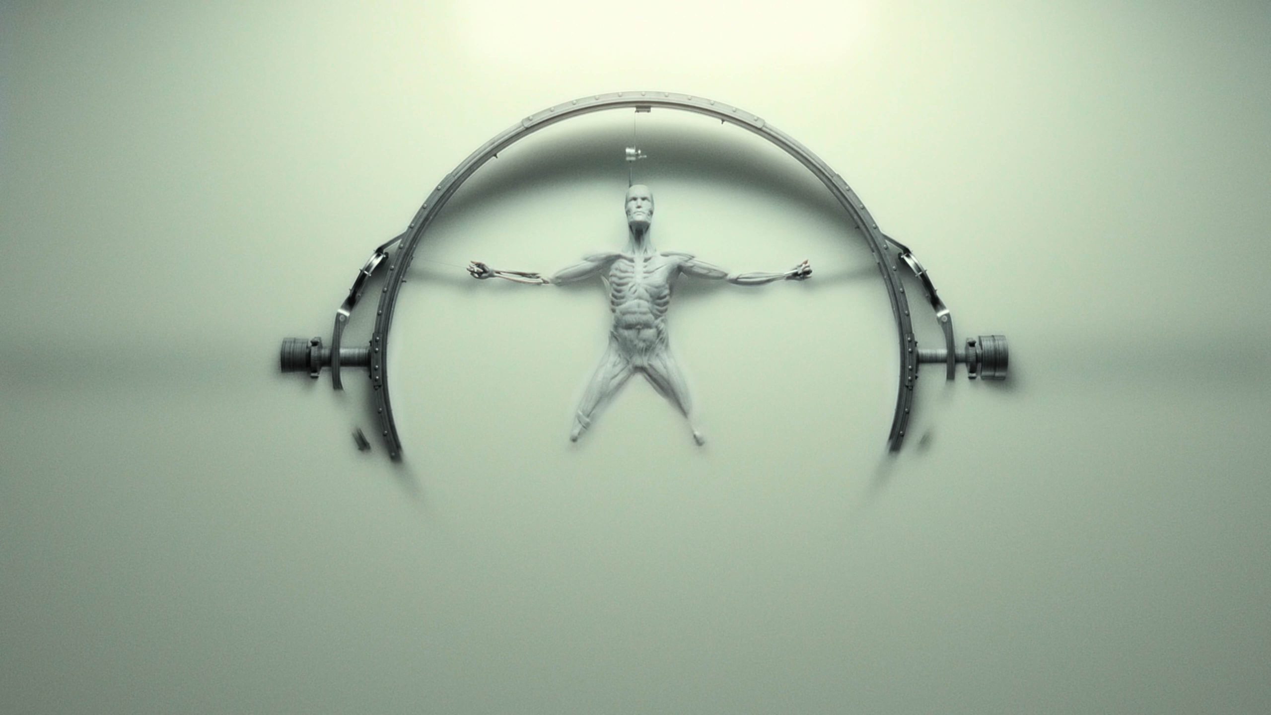 Screengrab from Westworld s1 opening credits showing host being submerged in white goop