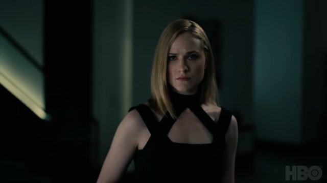 Image of a woman in a black dress.