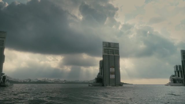 Screengrab of large pylon machinery surrounding Westworld perimeter