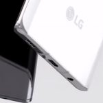 The bottom. That's a headphone jack!