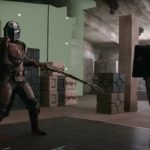 Executing a few fighting moves in front of a green screen.