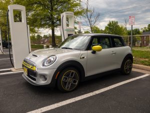 An electric Mini Cooper at a fast charger