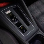 A little over half of GTI buyers pick the seven-speed DSG transmission, but a six-speed manual will still be available. The plaid print on the seats is a classic GTI touch.