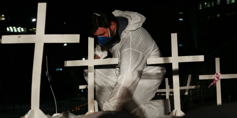 Stacked coffins in mass graves: COVID-19 ravages Latin America
