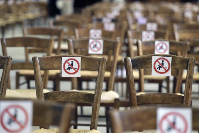 Social distancing signs are seen on chairs at Sainte Clotilde Basilic on May 31, 2020 in Paris, France.