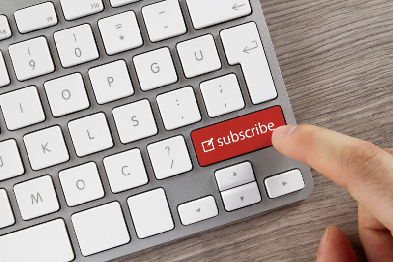 A shift key on this keyboard has been replaced with a red subscribe key.