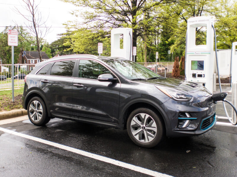 A Kia Niro EV plugged into a DC fast charger