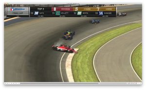 A screenshot of the IndyCar racing broadcast showing a car spinning