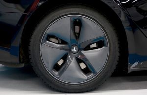 A Tesla Model 3 aerodynamic wheel covering