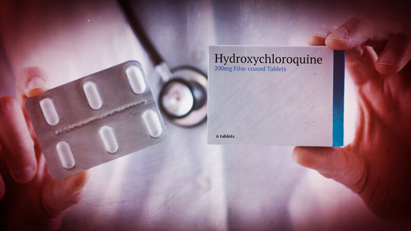Closeup image of hands holding a small box labeled hydroxychloroquine.
