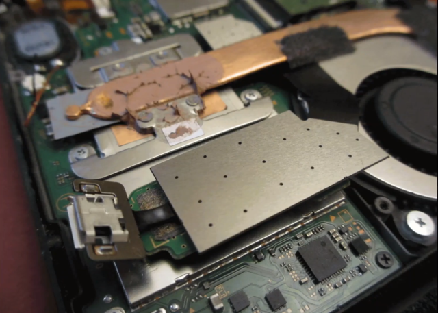 A prototype of an SX Pro device soldered to a Nintendo Switch motherboard.