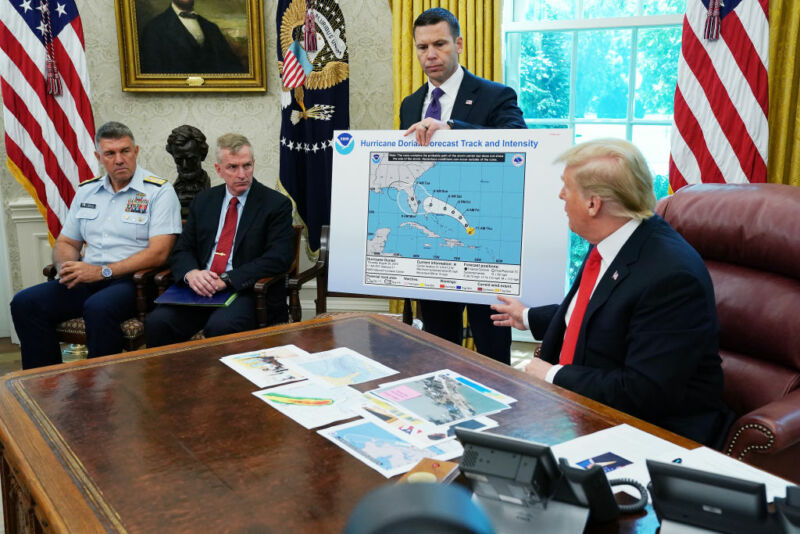 President Trump points to a map that has undergone some post-printing modifications.