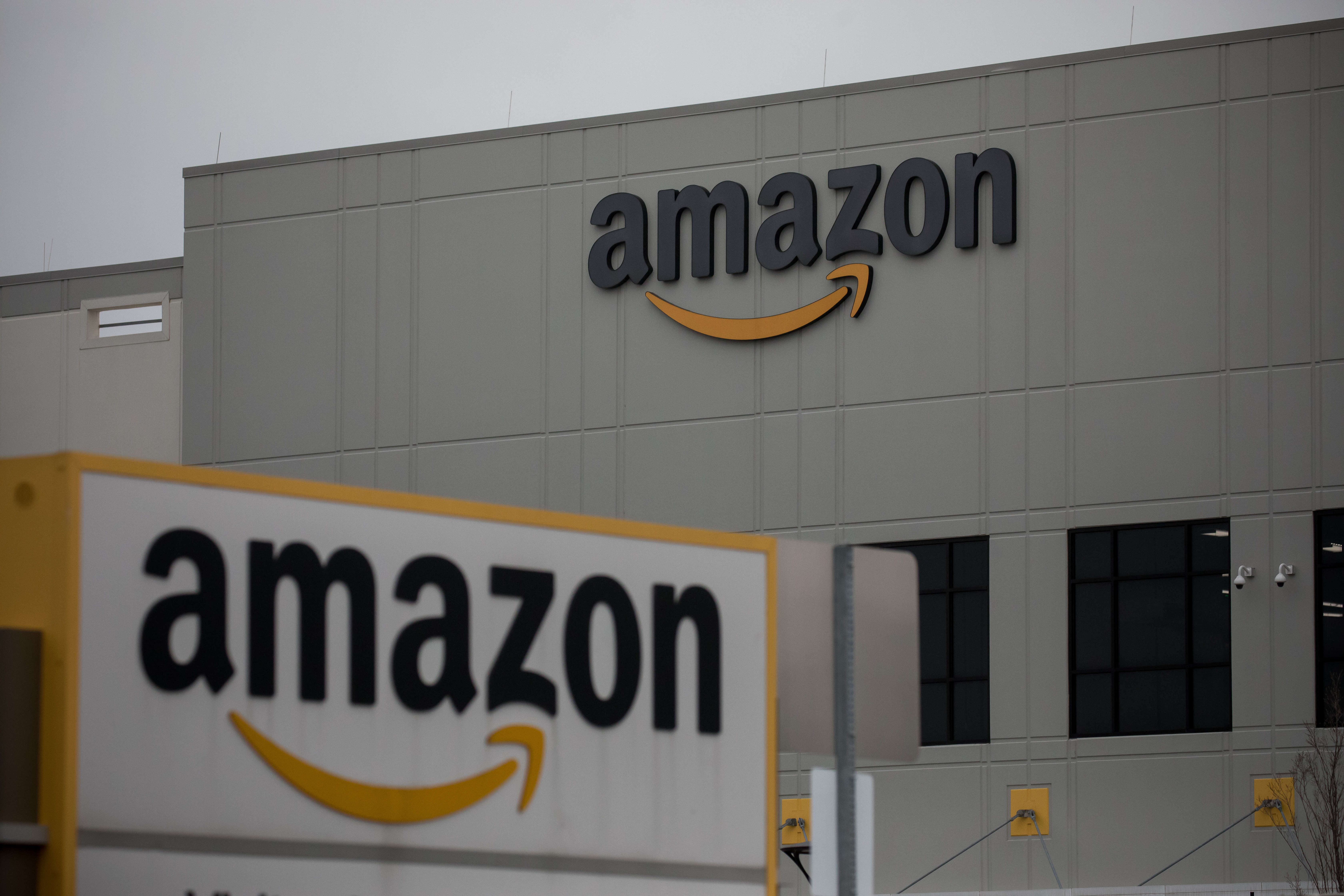 Amazon.com Inc. signage is displayed in front of a warehouse in Staten Island, New York, US, on Tuesday, March 31, 2020.