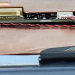 The copper sheet bolted to the top of the CPU is no thicker than a cheap business card. There are no ridges, no larger block, no heat pipes... just a sad sheet of copper.