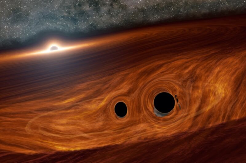 Artist's concept of a supermassive black hole and its surrounding accretion disk of gas. Embedded within this disk are two smaller black holes, orbiting one another, that eventually collided and may have produced a detectable burst of light.