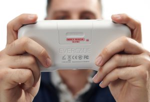Promotional image of portable video game device.