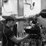 A Cosworth engineer works on development of the T.50's engine.